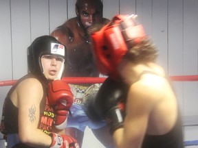 Sarnia's Dylan Taylor, left, spars with fellow River City boxer Blake Loxton during a recent practice. Taylor, 17, will compete in his first World Boxing Council (WBC) Canadian Championships this Friday. (BARBARA SIMPSON/THE OBSERVER/QMI AGENCY)