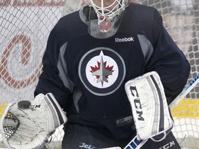 Jets backup goalie Michael Hutchinson had a tough pre-season and an even tougher first start of the season, lasting just 22 minutes.