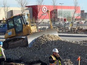Road construction continues on St. James Street in Winnipeg, Man. Wednesday Oct. 15, 2014 near the new Target store.