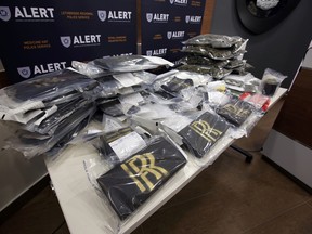 The Alberta Law Enforcement Response Team displays recent $750,000.00 drug bust at ALERT headquarters  Edmonton, Alberta on Wednesday, October 15, 2014.  Perry Mah/Edmonton Sun