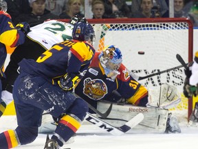 London Knights forward Michael McCarron fires the puck over Erie Otters goalie Devin Williams for a goal in his first OHL game of the season, Oct. 15, 2014, at Budweiser Gardens. The Knights won 4-3 in a shootout. (CRAIG GLOVER, The London Free Press)