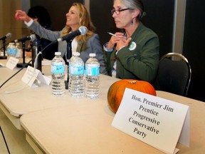 A pumpkin replaces Premier Jim Prentice at the Edgemont All Candidates Debate & Forum for Calgary-Foothills at the Edgemont Community Association in Calgary, Alta. on Wednesday October15, 2014. 
Darren Makowichuk/Calgary Sun/QMI Agency