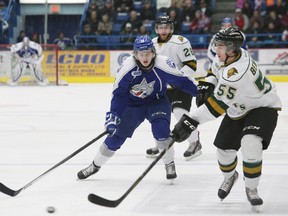 Connor Burgess (left) plays against London Knights.