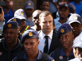 South African Olympic and Paralympic sprinter Oscar Pistorius leaves the North Gauteng High Court in Pretoria, October 16, 2014. Pistorius returned to the court on Thursday on the fourth day of sentencing procedures for the negligent killing of his model girlfriend Reeva Steenkamp.  (REUTERS)