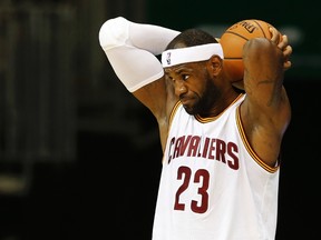 Cleveland Cavaliers forward LeBron James attends a NBA Global Games Rio 2014 basketball game against Miami Heat in Rio de Janeiro October 11, 2014.  REUTERS/Sergio Moraes