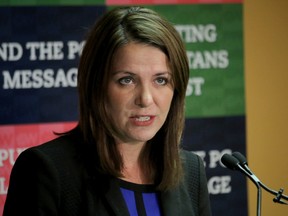 Wildrose leader Danielle Smith speaks about PC party financing at a press conference in Calgary, Alta., on Thursday October 16, 2014.