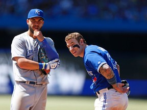 K.C.’s Eric Hosmer (left) has been lighting it up in the playoffs, while Blue Jays’ Brett Lawrie, well let’s just hope he will be ready for spring training. (Micheal Peake/Toronto Sun)