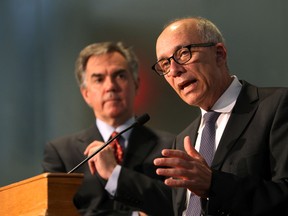 Premier Jim Prentice and Health Minister Stephen Mandel unveil their plan to ease hospital bed shortages, at a press conference Monday. (EDMONTON SUN/File)