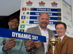 Wendel Clark (centre), jockey Patrick Husbands (left) and ex-jockey Sandy Hawley at the Pattison Canadian International draw. (Michael Burns, photo)