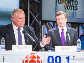 Doug Ford (left) and John Tory during the Toronto mayoral candidates debate at the CBC in Toronto on Thursday October 16, 2014. (Ernest Doroszuk/Toronto Sun)
