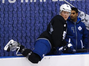 Leafs' Jake Gardiner coming off  the bench at practice at the Mastercard Centre in Toronto on Thursday October 16, 2014. (Craig Robertson/Toronto Sun)