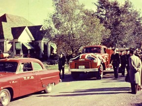 On Oct. 31, a little more than two weeks after Hurricane Hazel pummeled Toronto and its environs, a memorial service was held in the Kingsway-Lambton United Church to honour the township’s five volunteer firemen who died in the dark waters of the raging Humber River. In this photo we see the new fire truck that was purchased by the community to replace the vehicle destroyed during the hurricane.