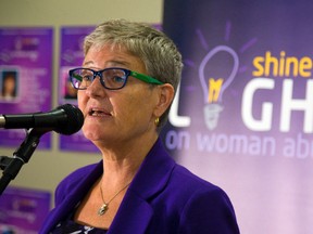 Megan Walker, the executive director of the London Abused Women's Centre speaks during the media launch of the Shine the Light on Woman Abuse campaign that spans the month of November. 
Mike Hensen/The London Free Press/QMI Agency