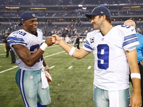 Dallas Cowboys running back DeMarco Murray (29) celebrates with quarterback Tony Romo (9) after the game against the New Orleans Saints at AT&T Stadium. (Matthew Emmons-USA TODAY Sports)