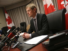 Dr. Gregory Taylor Canada's Chief Public health officer discusses Canada's preparedness to the media for the Ebola threat on Monday October 13, 2014 at a downtown Toronto government office. Jack Boland/Toronto Sun/QMI Agency