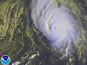 Hurricane Gonzalo is seen in a NOAA image from the GOES satellite taken over the Atlantic Ocean at 07:45EDT October 17, 2014.  

REUTERS/NOAA/Handout via Reuters