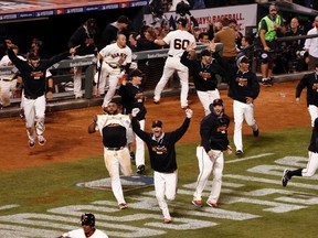 The San Francisco Giants celebrate their NLCS win over the St. Louis Cardinals. (USA Today Sports)