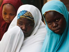 Internally displaced persons (IDP), who are victims of Boko Haram attacks, stay at the IDP camp for those fleeing violence from Boko Haram insurgents at Wurojuli, Gombe State September 2, 2014. REUTERS/Samuel Ini