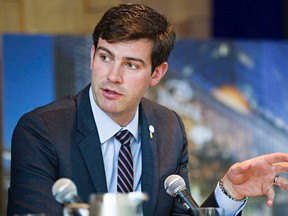 Edmonton Mayor Don Iveson speaks during an announcement at the Art Gallery of Alberta that a new Delta Hotel will be built in the arena district in Edmonton, Alta., on Monday, Oct. 6, 2014. Codie McLachlan/Edmonton Sun/QMI Agency