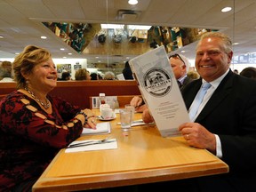 Toronto mayoral candidate Doug Ford has lunch with Sue-Ann Levy at United Bakers restaurant at Lawrence and Bathurst in Toronto on Oct. 9, 2014. (Michael Peake/Toronto Sun)
