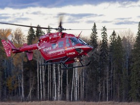 A STARS air ambulance lands at the Whitecourt airport on Sunday, Oct. 12, 2014 in Whitecourt Alta. STARS was called to respond to to transport a 28-year-old female with critical injuries to Royal Alexandra Hospital, in Edmonton, Alta. from Whitecourt after she sustained critical injuries in a quad rollover.
Adam Dietrich | Whitecourt Star photo