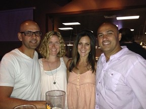 Former Calgary teacher Neil Bantleman, left, is being detained in Indonesia after being named a suspect in relation to a case of alleged sexual abuse at a school in Jakarta. He is pictured here with wife, Tracy (middle left) brother Guy Bantleman (right), and Guy's partner Janet Gallucci. Photo courtesy of Guy Bantleman