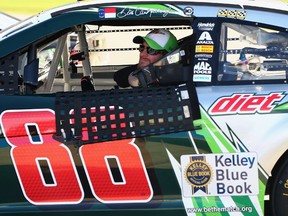Dale Earnhardt Jr., sits in his car during qualifying for the NASCAR Sprint Cup Series GEICO 500 at Talladega Superspeedway in Talladega, Ala., yesterday. He qualified 28th. (afp)