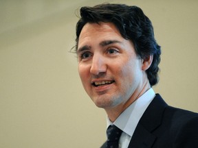 Conservative attack ads on Liberal Leader Justin Trudeau were cited as an example by media executives calling themselves the Consortium why they need to co-ordinate their policies. (QMI Agency file photo)