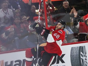 Ottawa Senators' Mike Hoffman celebrates his game winning goal against the Columbus Blue Jackets' during NHL hockey action at the Canadian Tire Centre in Ottawa, Ontario on Saturday October 18, 2014. Errol McGihon/Ottawa Sun/QMI Agency