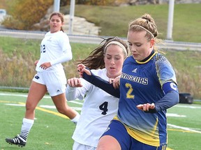 Laurentian Voyageurs Julie Lopez fights for the ball with Toronto Varsity Blues Sarah Gillett of the Tornto Varsity Blues during OUA soccer action from James Jerome Field on Sunday afternoon.