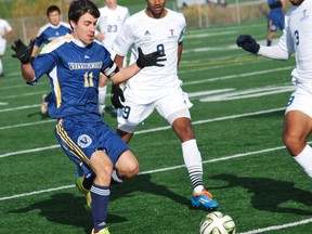 Voyageurs' Stephane Jacques handles the ball during OUA men's soccer action at James Jerome Sports Complex. A 5-0 loss to Toronto and a 2-1 win by Nipissing over Ryerson, eliminated the Voyageurs from reaching the playoffs.