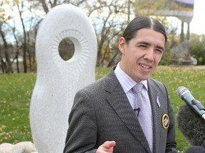 Mayoral candidate Robert-Falcon Ouellette speaks about murdered and missing aboriginal women at a press conference in Winnipeg, Man. Sunday, October 19, 2014.