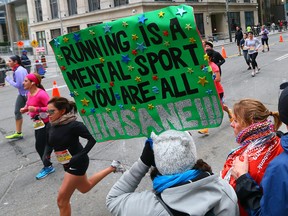 Runners pound the downtown streets during the Scotiabank Toronto Waterfront Marathon on Oct. 19. (DAVE ABEL, Toronto Sun)