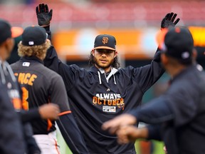 Brandon Crawford #35 of the San Francisco Giants warms up during batting practice prior to Game 1 of the National League Championship Series at Busch Stadium on October 11, 2014 in St Louis, Missouri.  (Dilip Vishwanat/Getty Images/AFP)