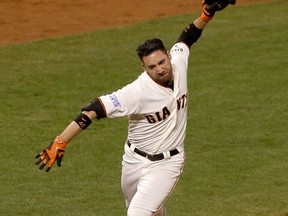 Travis Ishikawa emerged as the walkoff hero for the Giants in their NLCS win over the Cards. (AFP/PHOTO)