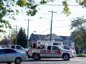 Pincher Creek Emergency Services arrive on scene near the post office where a man was struck by a white truck. The man was taken to hospital and was reported to be moving and talking. Greg Cowan photo/QMI Agency.