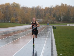 Liam Passi approaches the finish line during the senior boys 7km cross-country running city championships last Thursday at the Laurentian trails. Passi is this week's Cambrian College/Sudbury Star High School GameChanger award winner for his performance.
