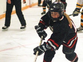 Vulcan atom Hawk Davanna Ditto skates the puck into the Nanton Palominos’ zone Saturday at the Tom Hornecker Recreation Centre during second period action of a tiering round in the Central Alberta Hockey League. The Hawks won the game 4-2. The squad played again on Sunday at the Vulcan District Arena against High River, which ended up winning 12-1. Coach Wyatt McMorris said that’s what happens during tiering rounds, which help determine how teams should be placed.