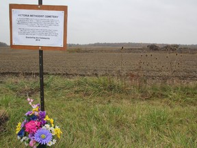 A roadside memorial has been posted near the site of what is believed to be a pioneer cemetery on Petrolia Line, between Sexton and Hardy Creek roads, in Brooke-Alvinston. BARBARA SIMPSON/THE OBSERVER/QMI AGENCY