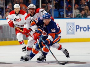 Former Maple Leafs winger Nikolay Kulemin carries the puck wearing No. 86 for the New York Islanders.  (Getty Images/AFP)