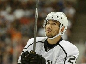 Los Angeles Kings defenceman Slava Voynov has been suspended indefinitely by the NHL in connection to a domestic violence charge. (USA Today Sports)