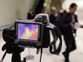 A thermal camera monitors the body temperature of passengers arriving to Tocumen International airport in Panama City October 15, 2014. (REUTERS/Rafael Ibarra)