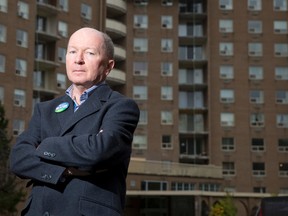 Ward 6 council candidate Alasdair Beaton stands outside of One Grosvenor St., a London apartment building where only nine residents out of the roughly 300 units are registered to vote. (CRAIG GLOVER, The London Free Press)