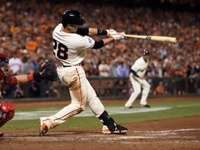 Buster Posey is going to have to keep coming up big in the clutch in the World Series for the San Francisco Giants. (USA Today Sports)