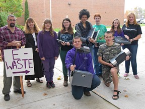 Organized by the VHSS Enviro Club, the 5th e-waste recycling fundraising event at Valley Heights Secondary School begins next week. Weekdays, Monday, Oct. 20th to Thursday, Oct. 30th, drop off e-waste at a bin in the parking lot in front of the school, from 9 a.m. - 3 p.m. VHSS is located south of Langton at 2561 Hwy 59. Acceptable items include – amplifiers, answering machines, AV players and recorders, cell phones and pagers, computers and monitors, computer peripherals, digital cameras, fax machines, printers and scanners, radios and speakers, receivers, and TVs. Household appliances are not be accepted. Stop in at the office if you need help unloading into the bin, or call 519-586-3522 for more information. More than 42,000 pounds of e-waste has been collected so far. Money raised through the recycling fundraiser have gone toward purchasing materials for outdoor benches, planting Carolinian trees, and helping to start an outdoor classroom. From left, with some of the first items donated for recycling, are (front) Enviro Club members Jesse Davidson, Jake Heinrichs, (back row) staff advisors Peter Gumulak and Beth Ardiel, and Enviro Club members Rosemary Atkinson, Kaitlyn Hammond, Jonathan Parry, Carter Lounsbury, Leicia Kelly and Erin Creed. (CHRIS ABBOTT/TILLSONBURG NEWS)