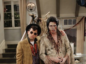 Jon Cryer as Alan Harper and Ashton Kutcher as Walden Schmidt in "Two and a Half Men."