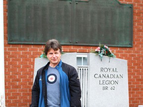Author Tom Slater stands in front of Branch 62 of the Royal Canadian Legion on Front Street North in Sarnia. Slater is releasing a book commemorating and honouring Sarnia's fallen soldiers of wars past and present. The plaques on the Legion's walls were orignially part of Sarnia's cenotaph, a memorial to soldiers killed overseas.
CARL HNATYSHYN/SARNIA THIS WEEK/QMI AGENCY