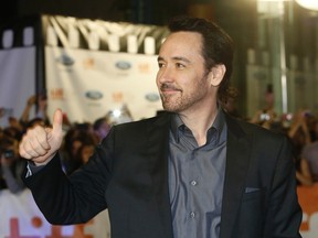 Actor John Cusack at the red carpet gala at Roy Thomson Hall for "Maps to the Stars" during the Toronto International Film Festival on September 10, 2014. (Jack Boland/Toronto Sun/QMI Agency)