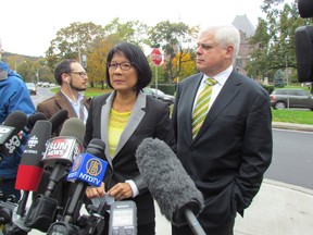 Toronto mayoral candidate Olivia Chow visits out front of Queen's Park on Tuesday October 22 2014 to remind voters that frontrunner John Tory was once the head of the Ontario Progressive Conservatives. She was joined by NDP MPPs Cheri DiNovo and Peter Tabuns, who both represent Toronto ridings. (ANTONELLA ARTUSO/Toronto Sun)