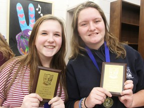Ursuline College Chatham Grade 10 students Jillian Akrey, left, and Larissa McFadden took first place at a debate tournament at SCITS this week. The team was a last-minute entry in the high school tournament. (TYLER KULA, The Observer)